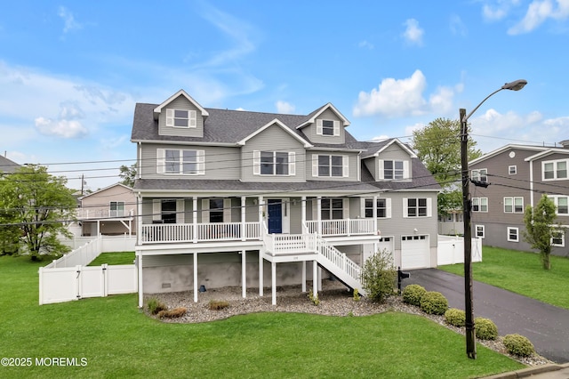 728 Brook Ave, Union Beach, NJ 07735 - view of front of house with an attached garage, a porch, driveway, stairway, and a shingled roof