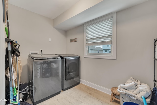 728 Brook Ave, Union Beach, NJ 07735 - laundry room with washer and clothes dryer, light wood-style flooring, and baseboards