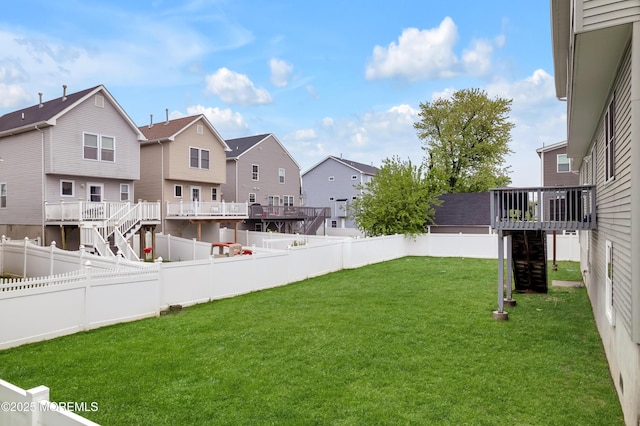728 Brook Ave, Union Beach, NJ 07735 - view of yard featuring a residential view, stairs, and a wooden deck