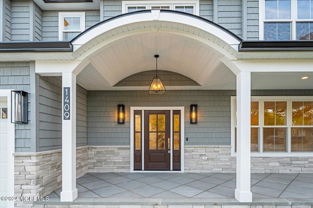 1119 Northstream Pkwy, Point Pleasant, NJ 08742 - view of exterior entry featuring covered porch and stone siding