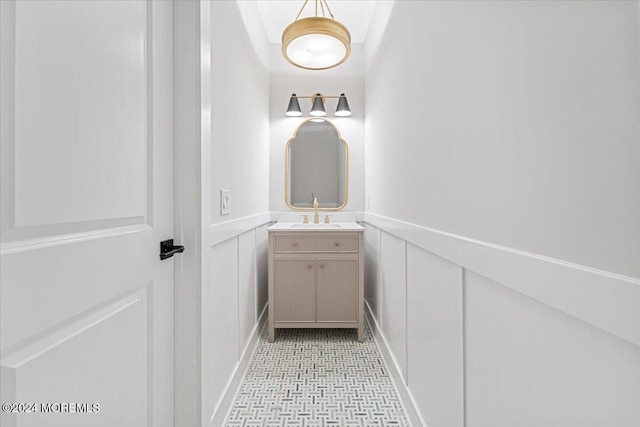 1119 Northstream Pkwy, Point Pleasant, NJ 08742 - bathroom with a decorative wall, vanity, and wainscoting