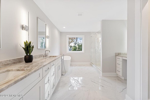 1119 Northstream Pkwy, Point Pleasant, NJ 08742 - full bathroom featuring marble tiled flooring, double vanity, a freestanding bath, a stall shower, and baseboards