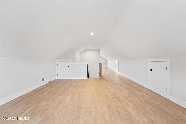 1119 Northstream Pkwy, Point Pleasant, NJ 08742 - additional living space featuring lofted ceiling, baseboards, light wood-style flooring, and recessed lighting
