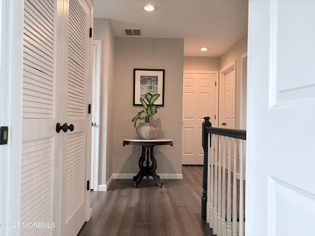 23 Brainard Ave, Port Monmouth, NJ 07758 - corridor with dark wood-type flooring, recessed lighting, and an upstairs landing