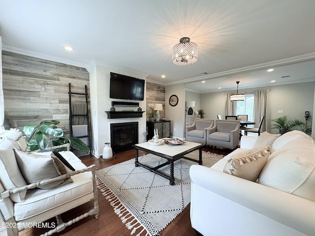 23 Brainard Ave, Port Monmouth, NJ 07758 - living area with a chandelier, recessed lighting, ornamental molding, wood finished floors, and a fireplace