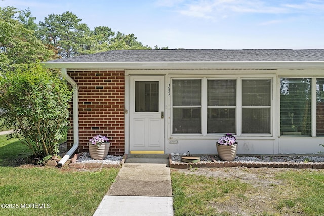 1036A Aberdeen Dr, Lakewood, NJ 08701 - property entrance with brick siding and roof with shingles