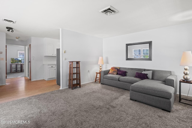 1036A Aberdeen Dr, Lakewood, NJ 08701 - living area featuring light colored carpet and baseboards