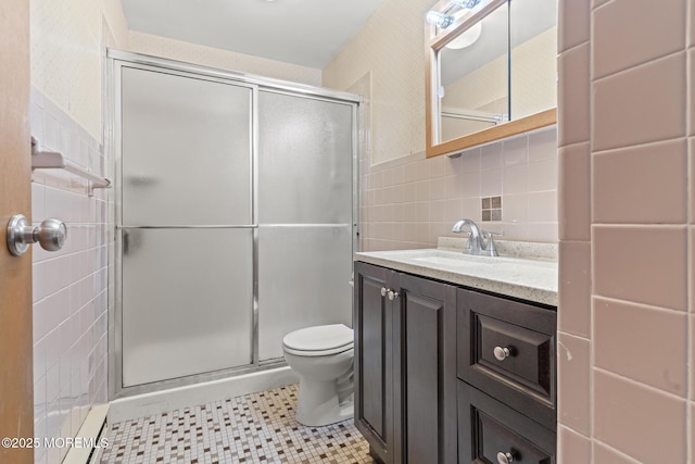 1036A Aberdeen Dr, Lakewood, NJ 08701 - full bath featuring tile walls, a shower stall, vanity, and tile patterned flooring