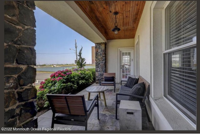 1 S Ocean Ave, Loch Arbour, NJ 07711 - view of patio / terrace featuring an outdoor hangout area and a water view