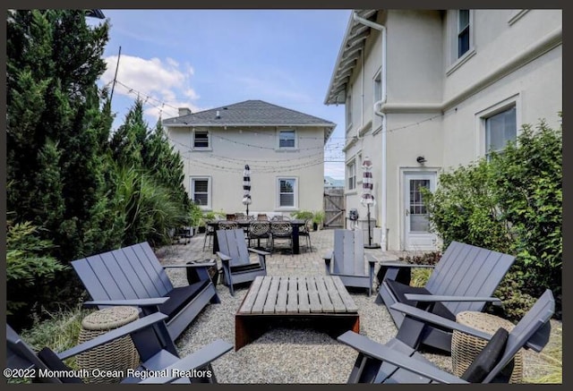 1 S Ocean Ave, Loch Arbour, NJ 07711 - view of patio featuring outdoor dining space and a gate