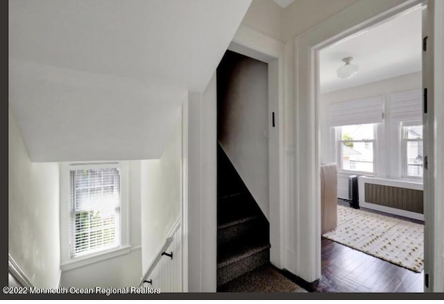 1 S Ocean Ave, Loch Arbour, NJ 07711 - stairway with radiator heating unit and wood finished floors