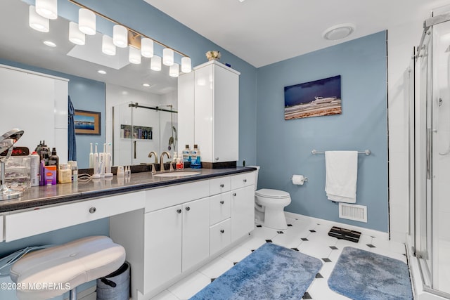 11 Kennedy Ct, Middletown, NJ 07748 - full bath with a stall shower, vanity, toilet, and baseboards