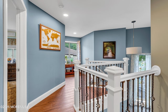 11 Kennedy Ct, Middletown, NJ 07748 - corridor with an upstairs landing, wood finished floors, baseboards, and recessed lighting