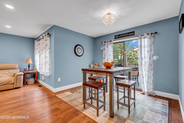 11 Kennedy Ct, Middletown, NJ 07748 - dining space with baseboards, wood finished floors, a chandelier, and recessed lighting
