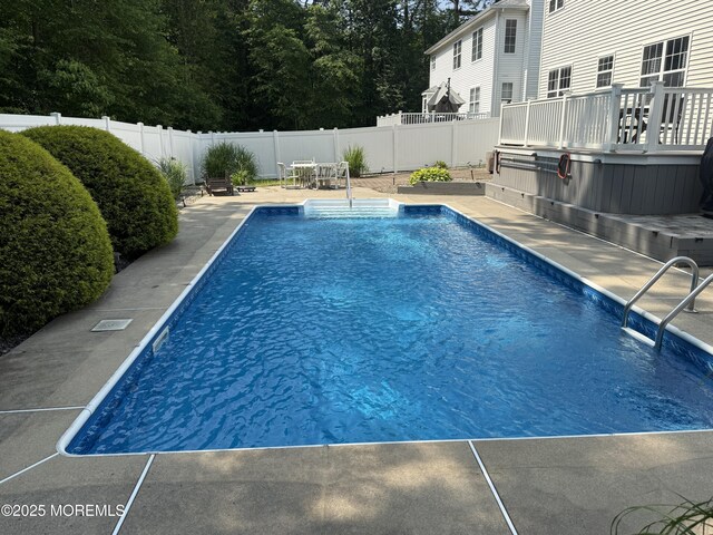 44 Diamond Ln, Howell, NJ 07731 - view of swimming pool featuring a patio and a fenced backyard