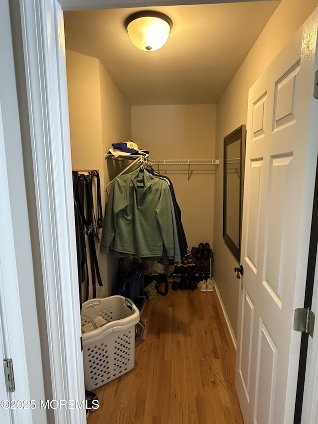 44 Diamond Ln, Howell, NJ 07731 - walk in closet featuring wood finished floors
