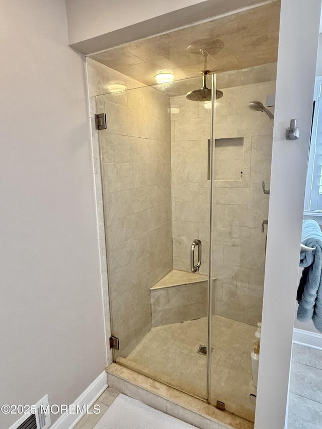 44 Diamond Ln, Howell, NJ 07731 - full bathroom featuring a shower stall and baseboards
