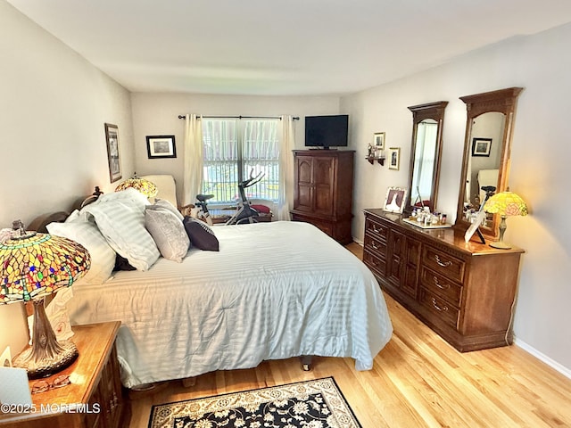 44 Diamond Ln, Howell, NJ 07731 - bedroom with light wood finished floors and baseboards