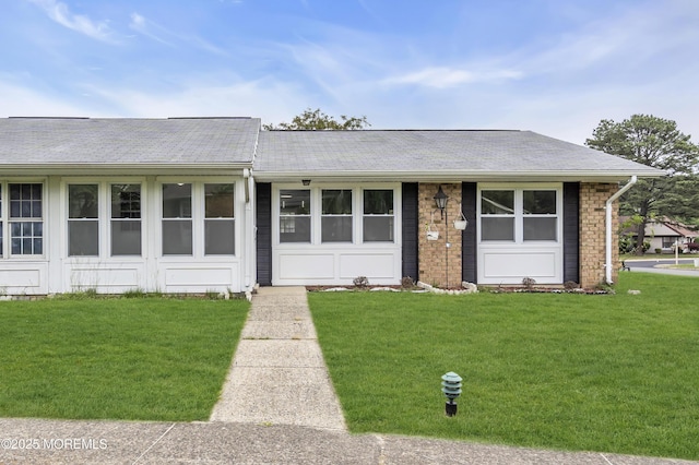 9 Edinburgh Ln Unit D, Manchester, NJ 08759 - ranch-style house featuring a front yard and roof with shingles