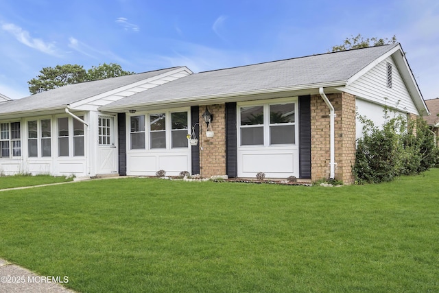 9 Edinburgh Ln Unit D, Manchester, NJ 08759 - single story home featuring a front yard, a shingled roof, and brick siding