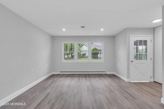 9 Edinburgh Ln Unit D, Manchester, NJ 08759 - unfurnished room with baseboard heating, wood finished floors, baseboards, and recessed lighting