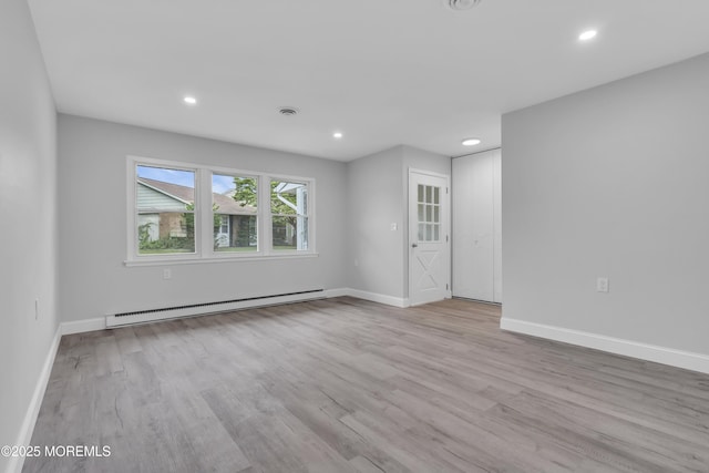 9 Edinburgh Ln Unit D, Manchester, NJ 08759 - unfurnished room with baseboard heating, wood finished floors, recessed lighting, and baseboards