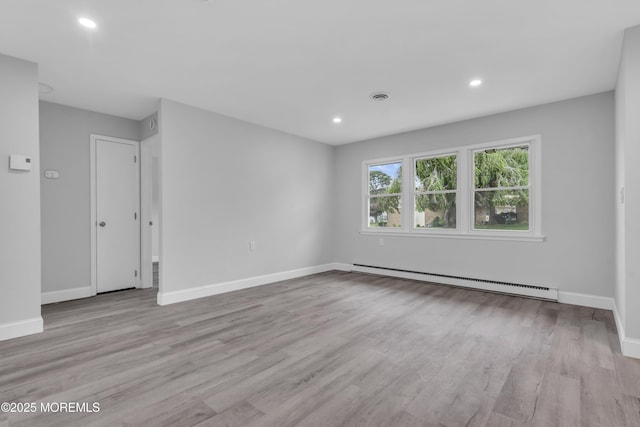 9 Edinburgh Ln Unit D, Manchester, NJ 08759 - spare room with baseboard heating, wood finished floors, baseboards, and recessed lighting