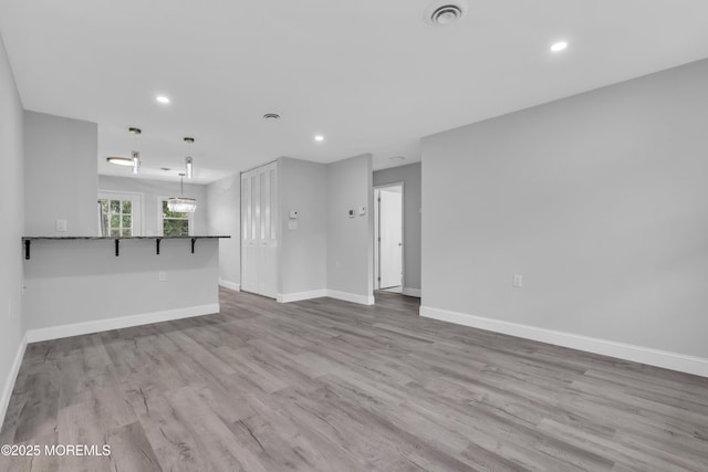 9 Edinburgh Ln Unit D, Manchester, NJ 08759 - unfurnished living room with baseboards, wood finished floors, and recessed lighting