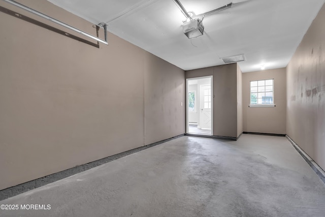 9 Edinburgh Ln Unit D, Manchester, NJ 08759 - garage featuring a garage door opener