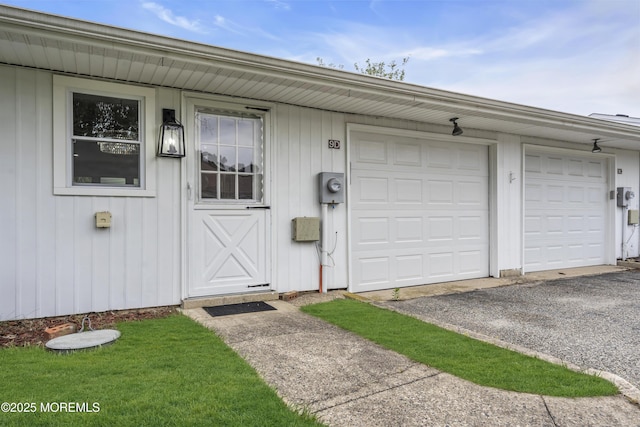 9 Edinburgh Ln Unit D, Manchester, NJ 08759 - doorway to property with a garage and driveway