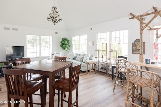 10 English Path, Freehold, NJ 07728 - dining area featuring light wood finished floors and high vaulted ceiling
