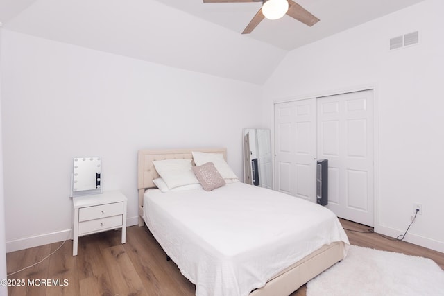 10 English Path, Freehold, NJ 07728 - bedroom with lofted ceiling, wood finished floors, a closet, and a ceiling fan