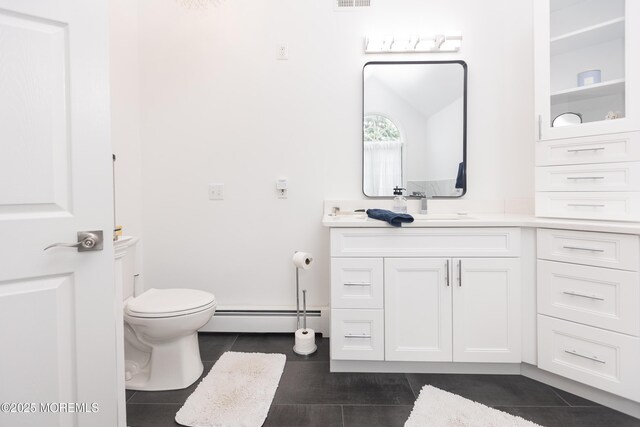 10 English Path, Freehold, NJ 07728 - bathroom featuring a baseboard radiator, tile patterned flooring, and vanity