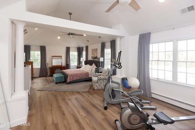 10 English Path, Freehold, NJ 07728 - bedroom with ornate columns, a baseboard heating unit, lofted ceiling, wood finished floors, and recessed lighting