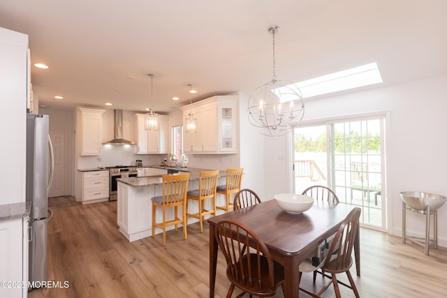 10 English Path, Freehold, NJ 07728 - dining area featuring a chandelier, light wood finished floors, and recessed lighting