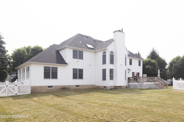 10 English Path, Freehold, NJ 07728 - back of house with a wooden deck, a chimney, a gate, and a shingled roof