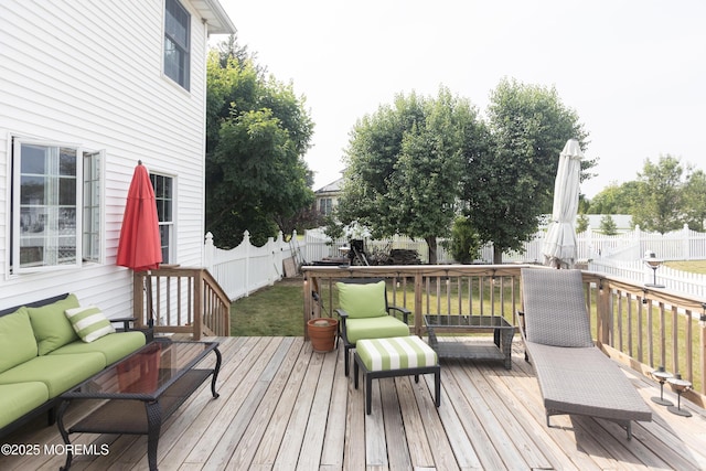 10 English Path, Freehold, NJ 07728 - wooden terrace featuring an outdoor hangout area and a fenced backyard