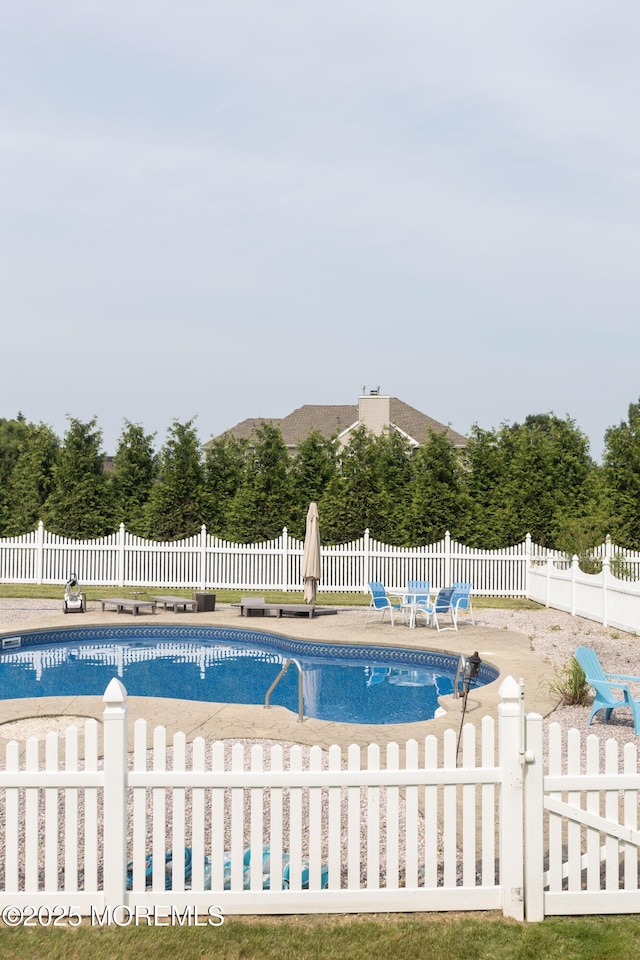 10 English Path, Freehold, NJ 07728 - view of swimming pool featuring a patio area and a fenced backyard