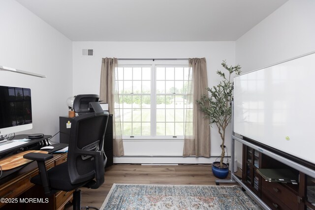 10 English Path, Freehold, NJ 07728 - office area featuring wood finished floors, plenty of natural light, and baseboard heating