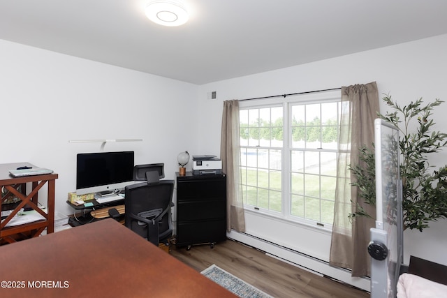 10 English Path, Freehold, NJ 07728 - office area featuring a baseboard heating unit and wood finished floors
