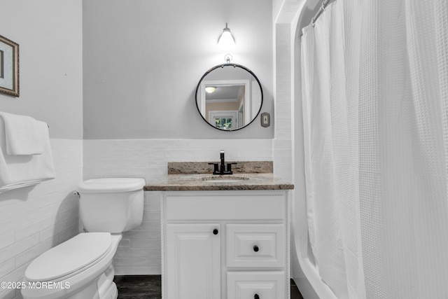1 Algonquin Dr, Marlboro, NJ 07746 - bathroom featuring vanity, tile walls, a wainscoted wall, and a shower with shower curtain