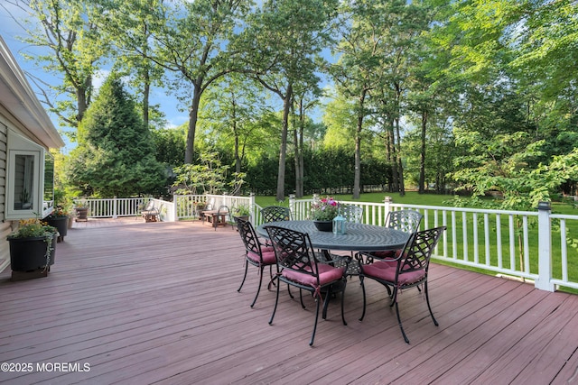 1 Algonquin Dr, Marlboro, NJ 07746 - deck with outdoor dining space, a yard, and view of wooded area