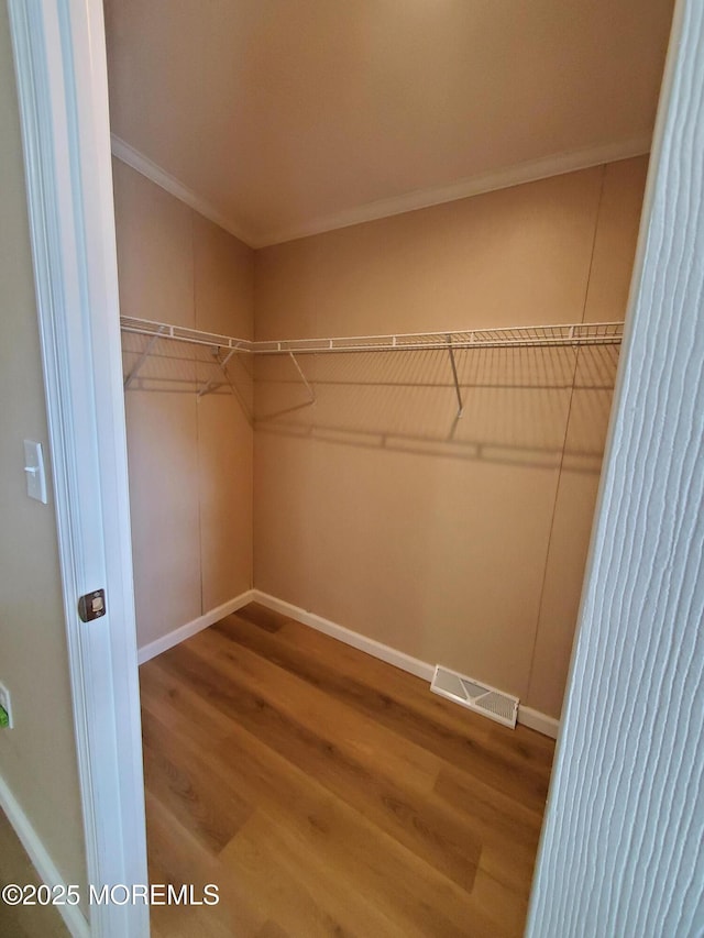 69 Robin Pl, Freehold, NJ 07728 - spacious closet with wood finished floors