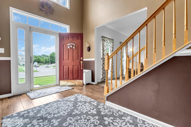 46 Timberline Rd, Bayville, NJ 08721 - foyer with stairway, plenty of natural light, wood finished floors, and a high ceiling