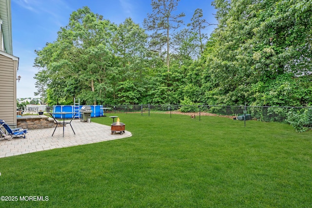 46 Timberline Rd, Bayville, NJ 08721 - view of yard featuring a patio area and an outdoor fire pit