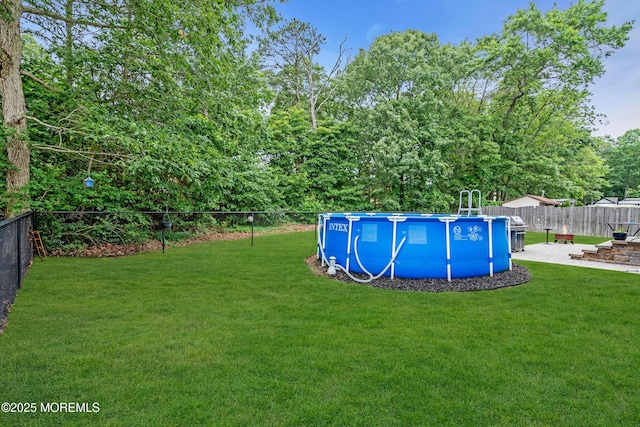 46 Timberline Rd, Bayville, NJ 08721 - fenced backyard with a patio area
