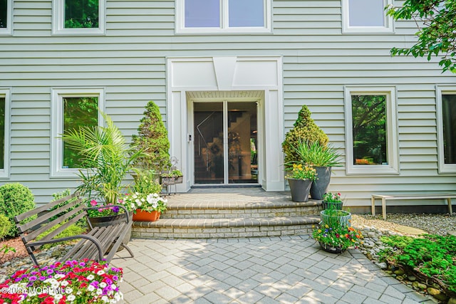 5 Leighton Dr, East Brunswick, NJ 08816 - view of exterior entry with a patio area