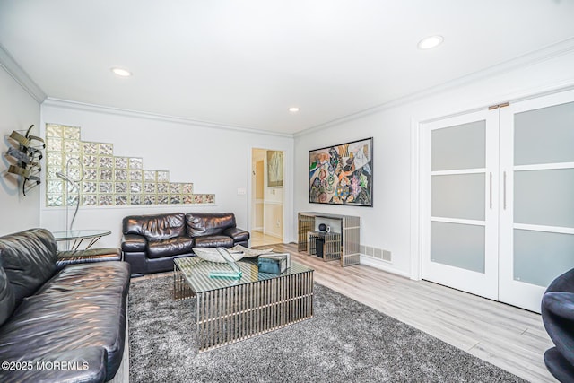 5 Leighton Dr, East Brunswick, NJ 08816 - living room with ornamental molding, wood finished floors, recessed lighting, and baseboards