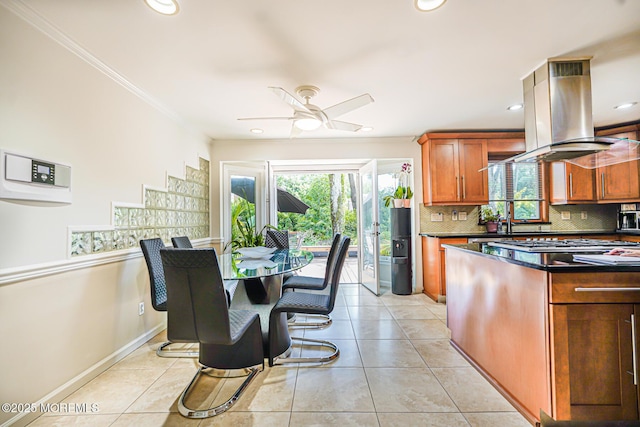 5 Leighton Dr, East Brunswick, NJ 08816 - kitchen with island range hood, dark countertops, tasteful backsplash, ceiling fan, and ornamental molding