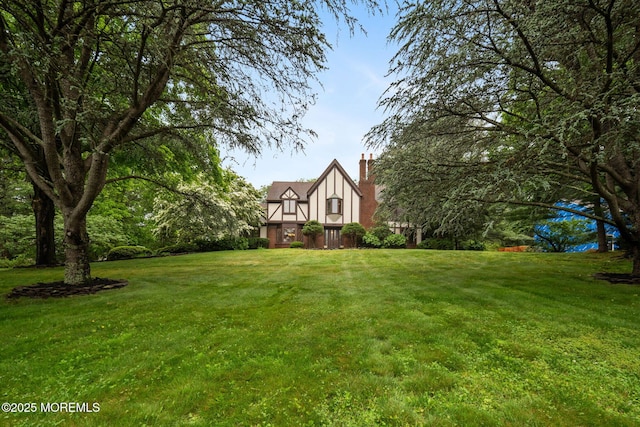 245 Borden Rd, Middletown, NJ 07748 - view of front of property featuring a front yard and a chimney